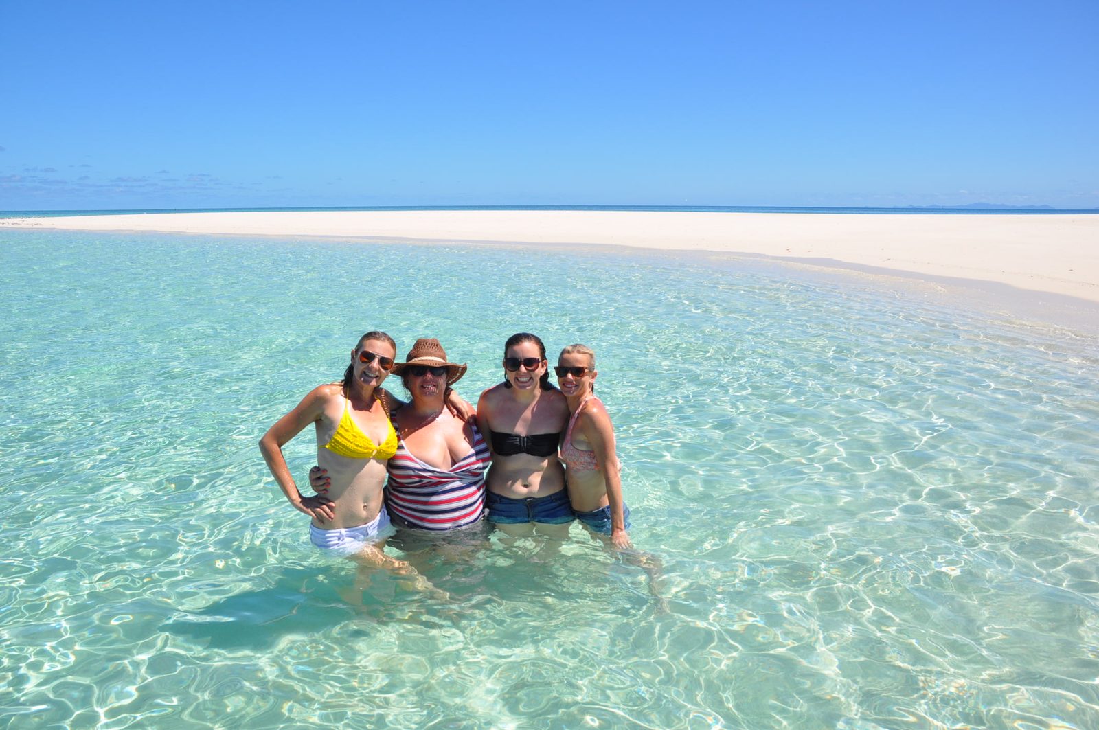 A swim stop on a white sandbar